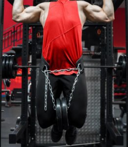 model-doing-chin-pull-ups-with-skates-sports-weightlifting-dipping-belt-front-view.jpg